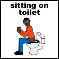 sitting on toilet